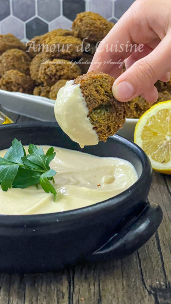 falafels dipped in hummus